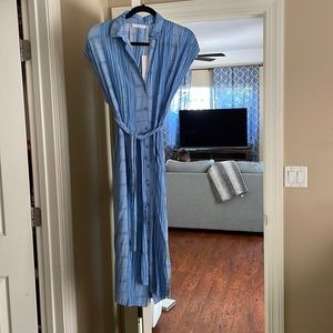 Lush mid length blue and white stripe dress with tie belt.